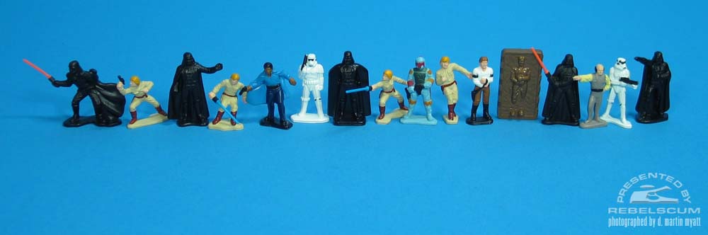  From Left To Right: Darth Vader (Fighting), Luke Skywalker (Aiming Gun), Darth Vader (Beckoning), Luke Skywalker (Falling), Lando Calrissian, Stormtrooper (Guarding), Darth Vader, Luke Skywalker (Fighting), Boba Fett, Luke Skywalker (with No Arm), Han Solo (Unfrozen), Han Solo (Frozen), Darth Vader (On Guard), Lobot, Stormtrooper (Aiming Gun), Darth Vader (Pointing)