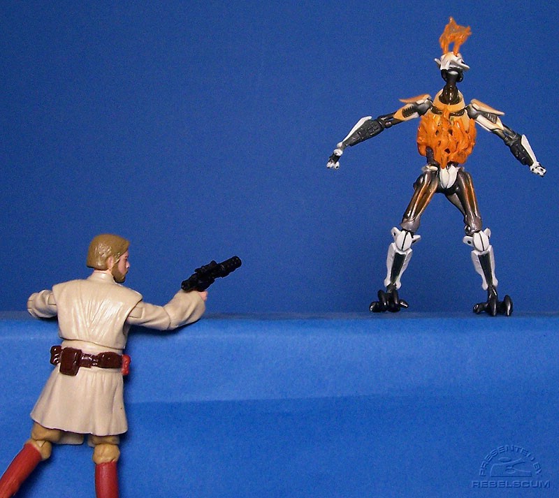 Obi-Wan blasts Grievous with his own blaster!